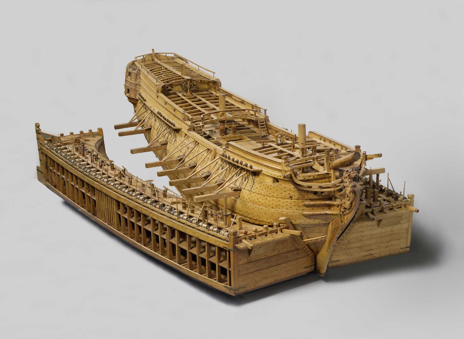 Wooden model from 1742 of a Dutch East India vessel with ship camels