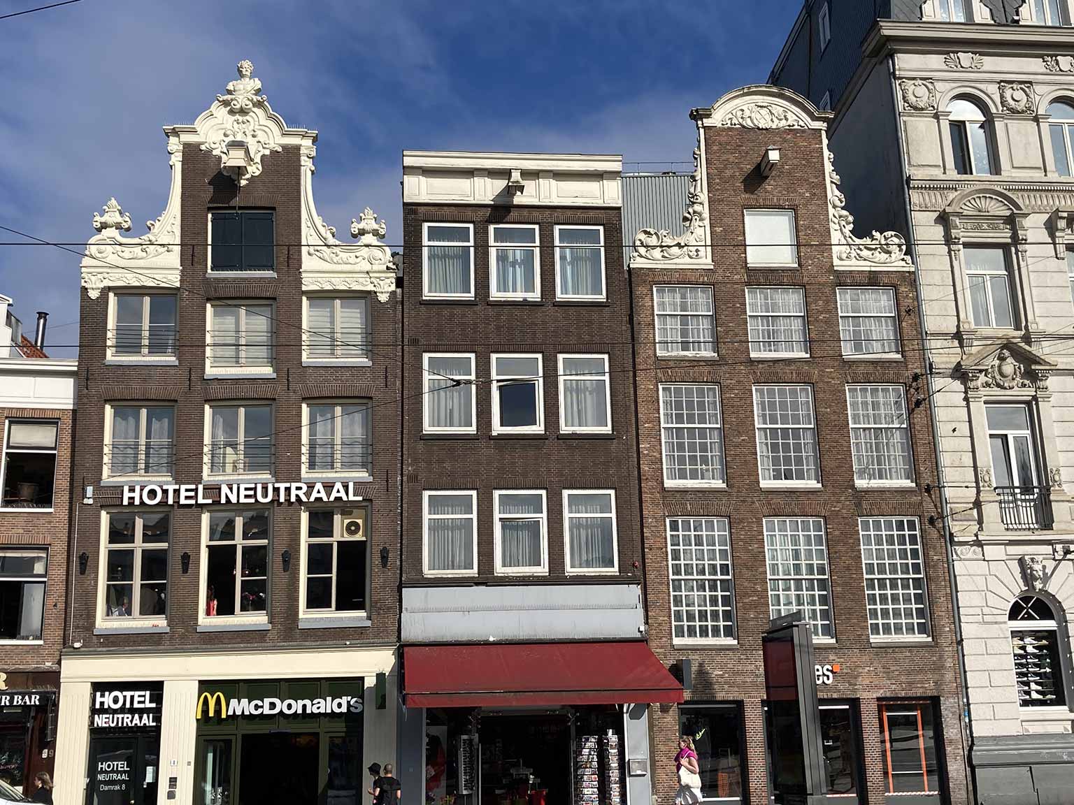 Damrak 8, 7 and 6 and a slice of the Victoria Hotel, Amsterdam