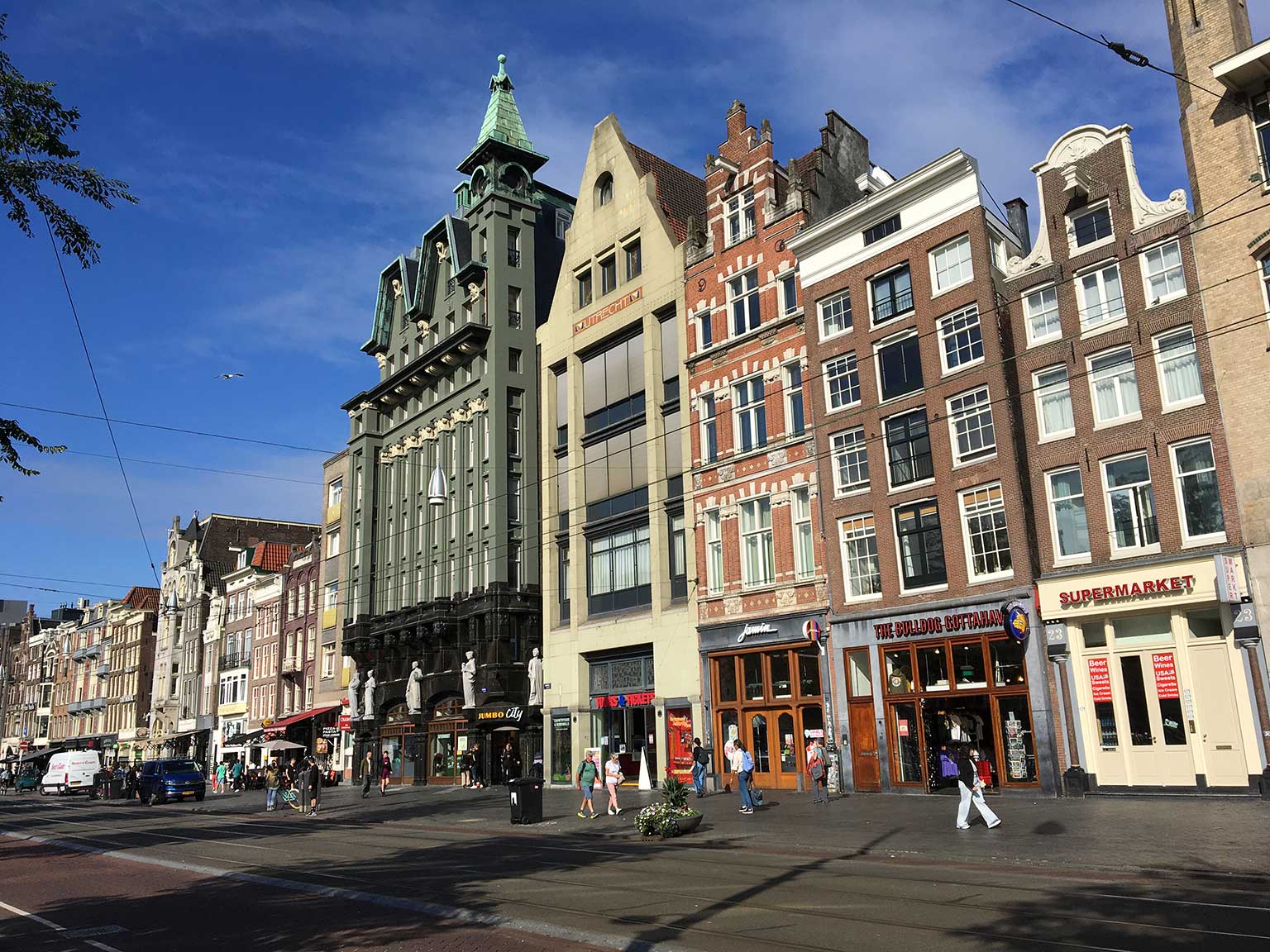 Damrak 25, Amsterdam, a red brick fish and fruit shop from 1906, now Jamin candy store