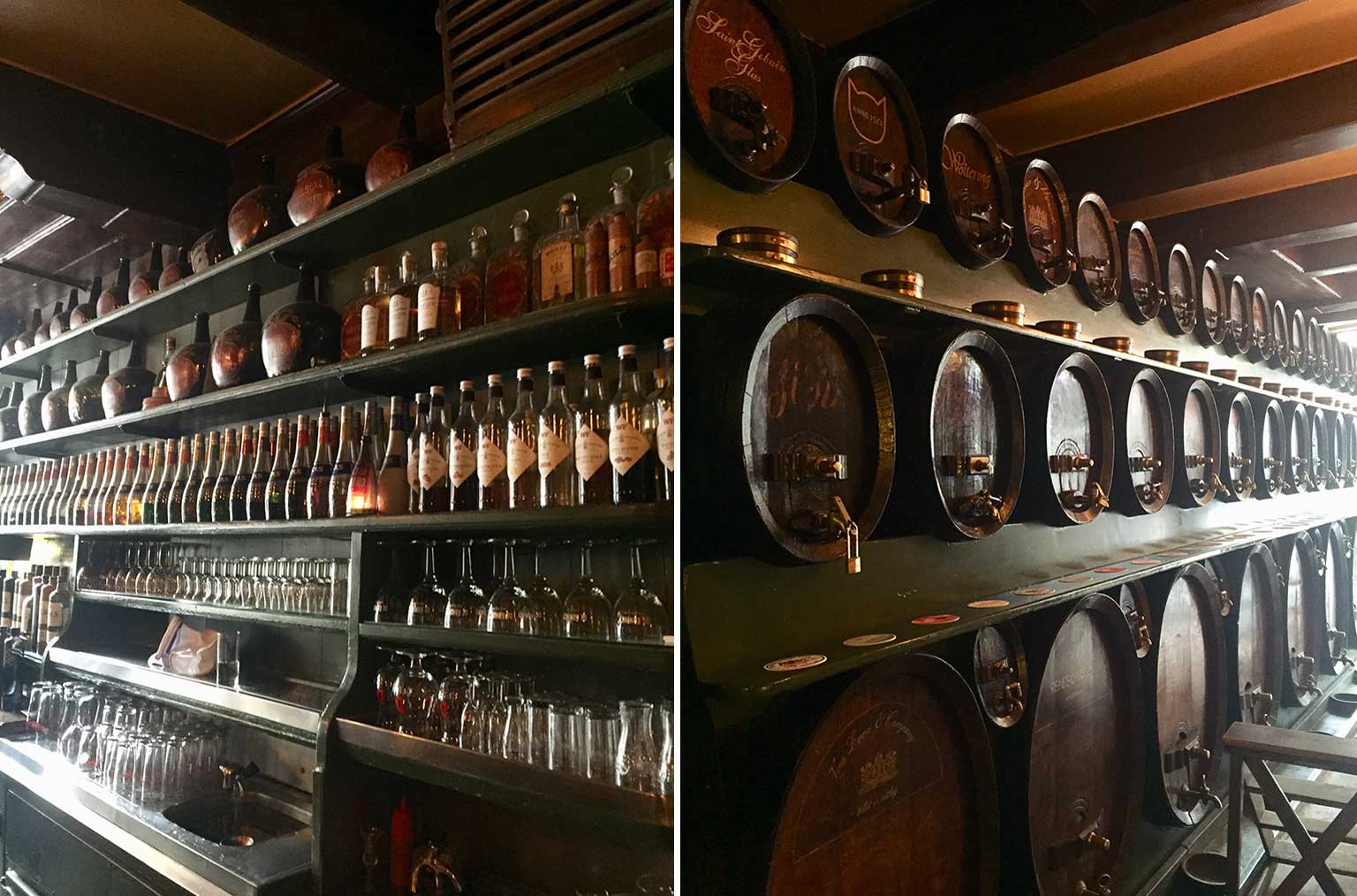 Inside De Drie Fleschjes, Amsterdam, bottles behind the bar and wall of casks