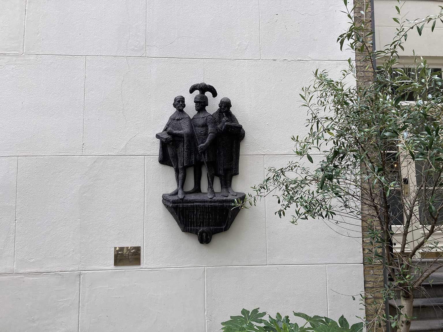 Sculpture on the wall of the courtyard of Hotel The Dylan, Keizersgracht 384, Amsterdam
