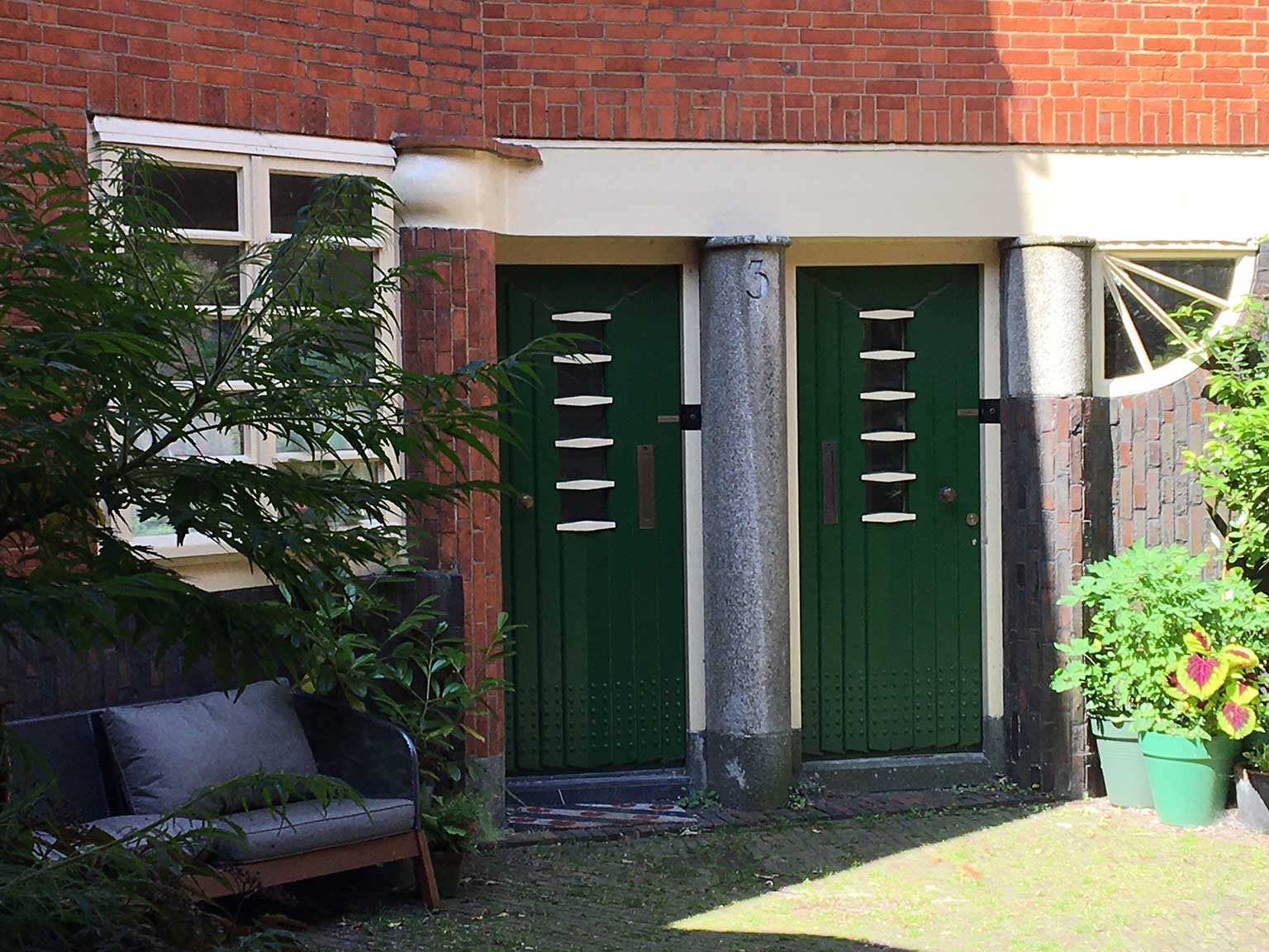 Housing block Het Schip, Amsterdam, apartment doors in the courtyard