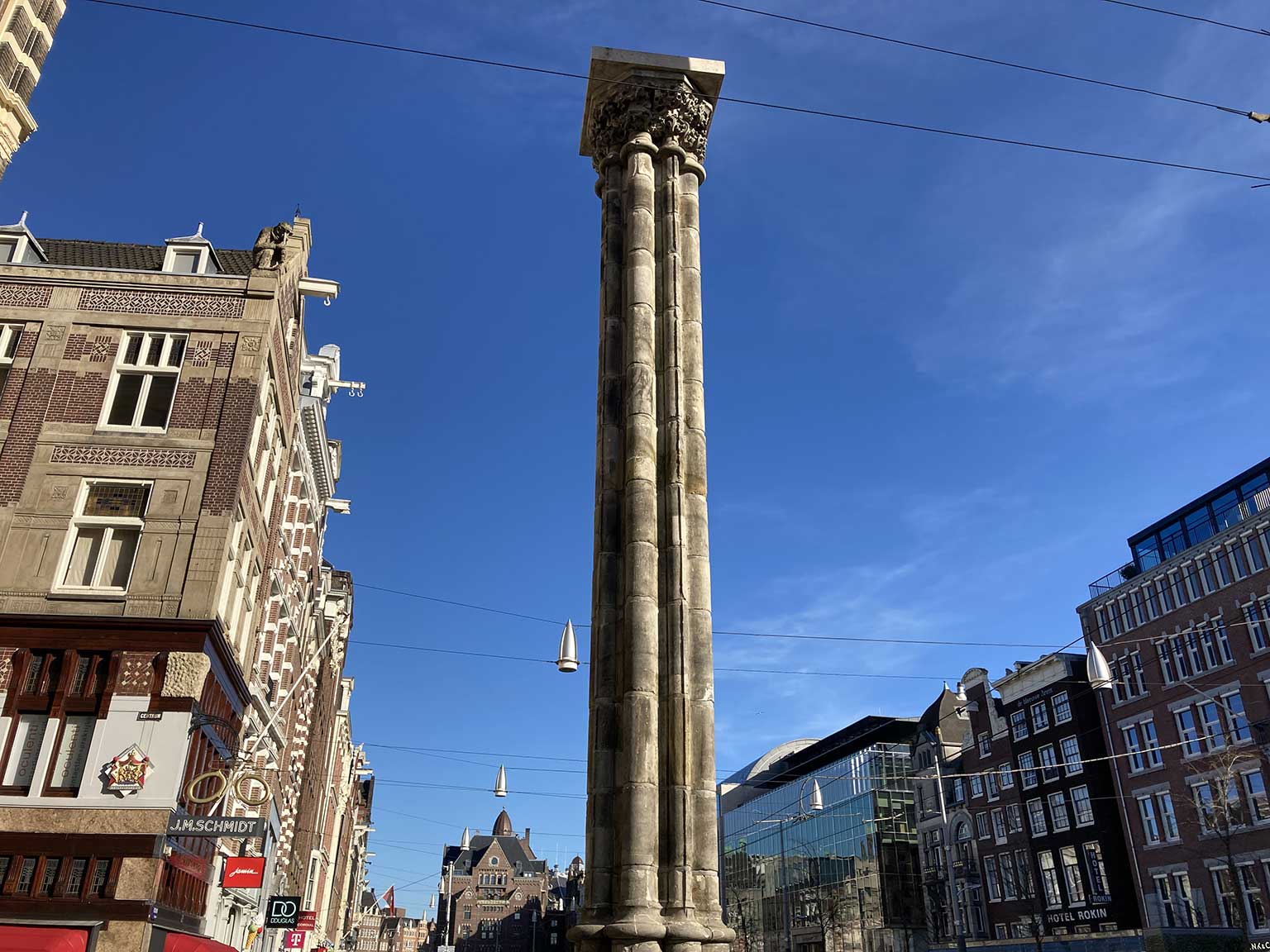 Miracle Column on Rokin, Amsterdam, near Wijde Kapelsteeg. Industria building in the distance