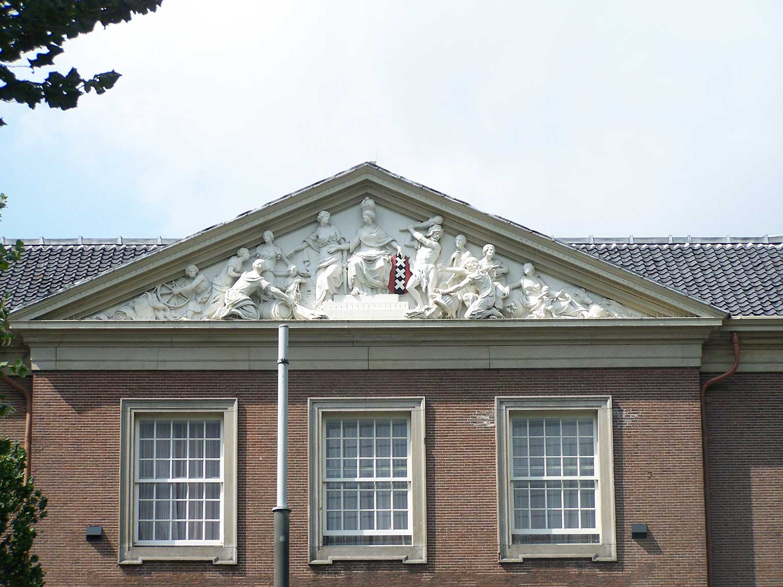 Tympanum on the Sarphatihuis, Amsterdam