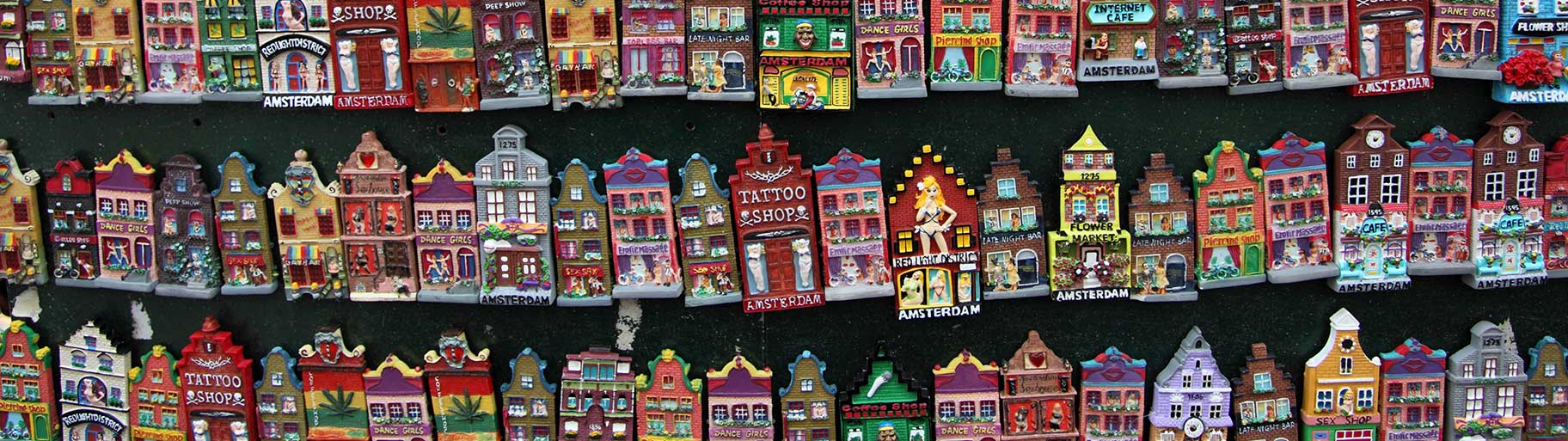 Three rows of ceramic magnets of Amsterdam houses